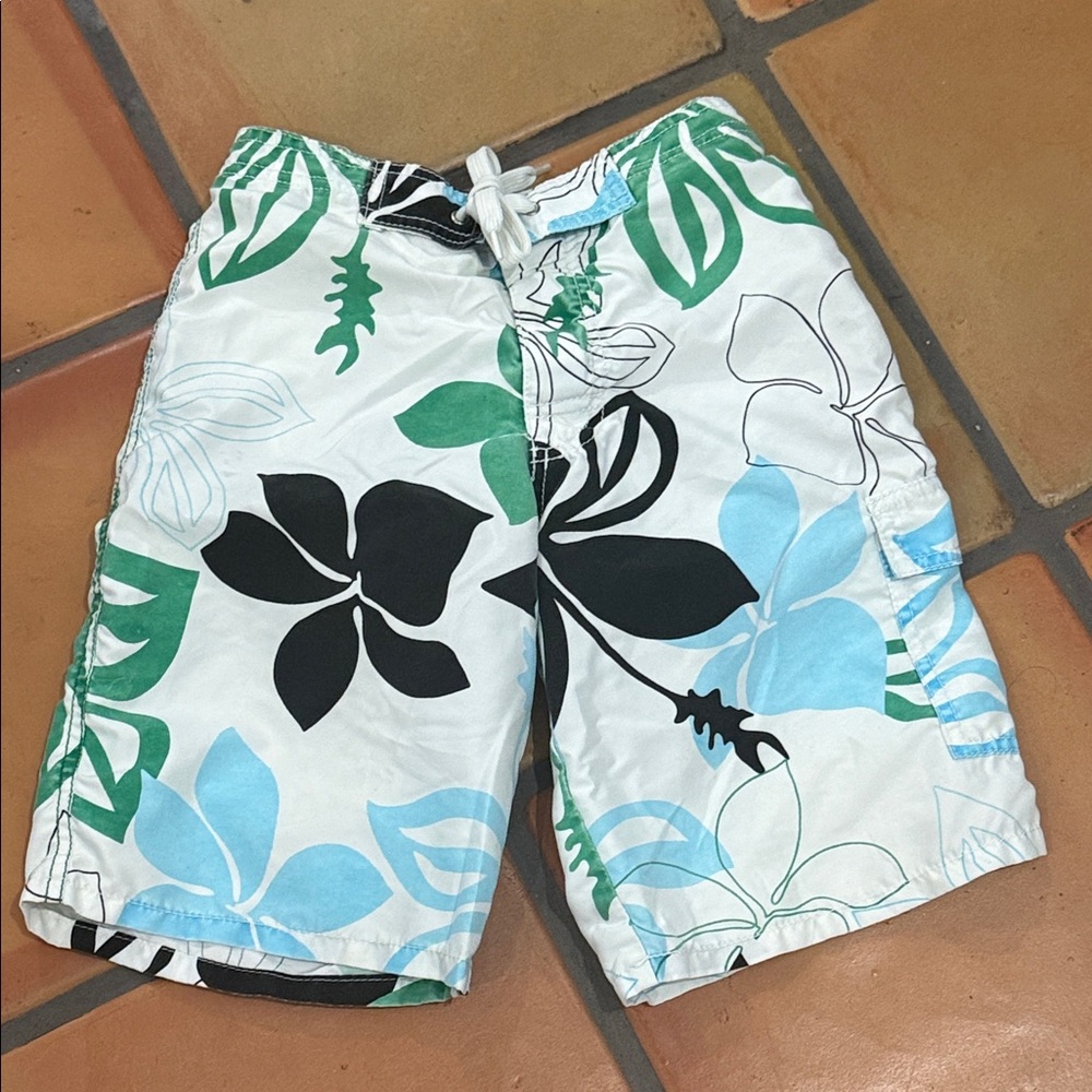 Charlie Rocket White Swim Shorts with Black, Blue & Green Tropical Print
